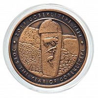 Монета из бронзы 2,5 лиры в капсуле Гёбекли Тепе. Турция 2019 UNC